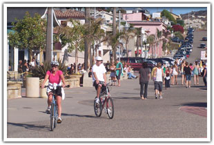 People riding bikes on the promenade 